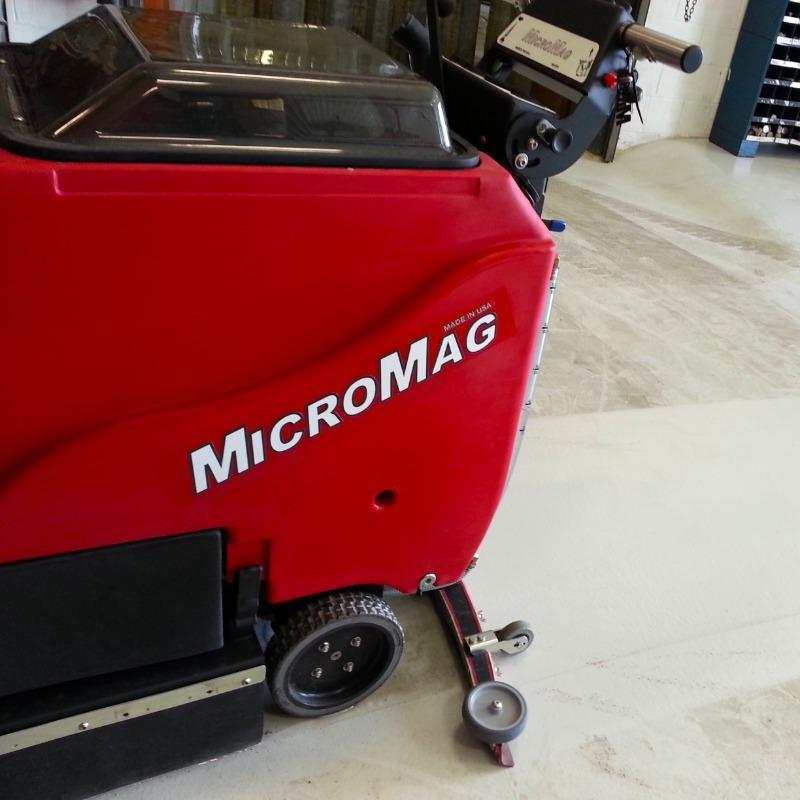 FactoryCat Walk Behind Floor Scrubbers MicroMag maintenance shop epoxy - https://assets.factorycat.com/demoImages/2025/april/MicroMag-Walk Behind Floor Scrubbers-maintenance shop-epoxy-Melbourne-USA-579.jpg - 800 - 800 - 579 MicroMag Walk Behind Floor Scrubbers cleaning the epoxy floor in an aviation maintenance shop in Melbourne, Florida