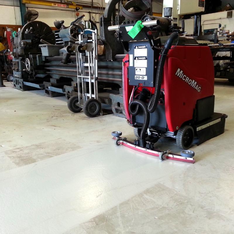 FactoryCat Walk Behind Floor Scrubbers MicroMag maintenance shop epoxy - https://assets.factorycat.com/demoImages/2025/april/MicroMag-Walk Behind Floor Scrubbers-maintenance shop-epoxy-Melbourne-USA-588.jpg - 800 - 800 - 588 MicroMag Walk Behind Floor Scrubbers cleaning the epoxy floor in an aviation maintenance shop in Melbourne, Florida